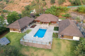 StayVista's Vyoman Villa - Experience a valley view, lush lawn, spa, and yoga retreat